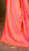 Saree with pink and orange gradient and white thread work on a plain background