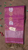 Purple saree with white floral patterns on a brown background