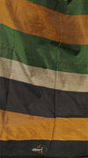 Close-up of a jacket with green, orange, and black horizontal stripes.