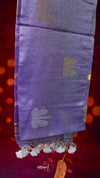 Purple fabric with floral patterns on a red background