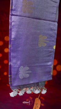 Purple fabric with floral patterns on a red background