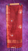 Red scarf with white patterns on a purple background