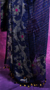 Navy blue embroidered garment with gold details on a purple background
