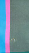 Textile with pink and blue stripes on a green background