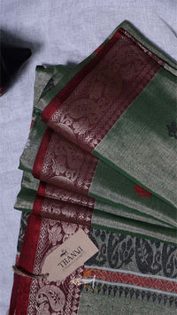 Green and red patterned fabric with a 'THANKS' tag on a light gray background
