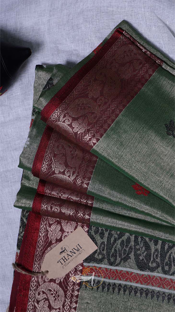 Green and red patterned fabric with a 'THANKS' tag on a light gray background