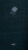Dark blue fabric with embroidered designs on a dark background