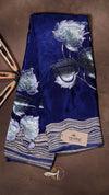 Blue scarf with floral patterns on a brown background