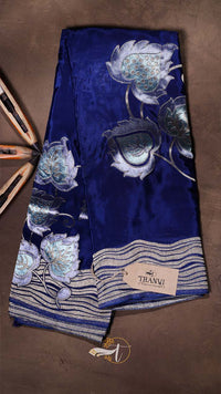 Blue scarf with floral patterns on a brown background