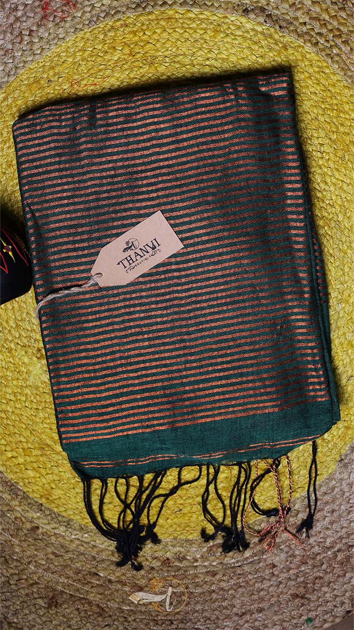 Striped fabric with a brand tag on a textured surface