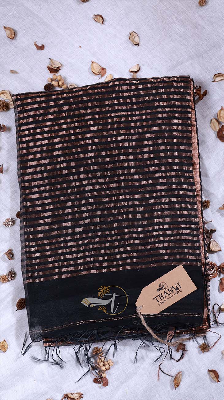 Textured scarf with a brand tag on a light gray background