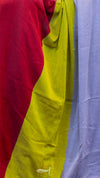 Colorful fabric swatch in red, yellow, and blue.