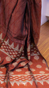 Red and white patterned fabric draped over a surface