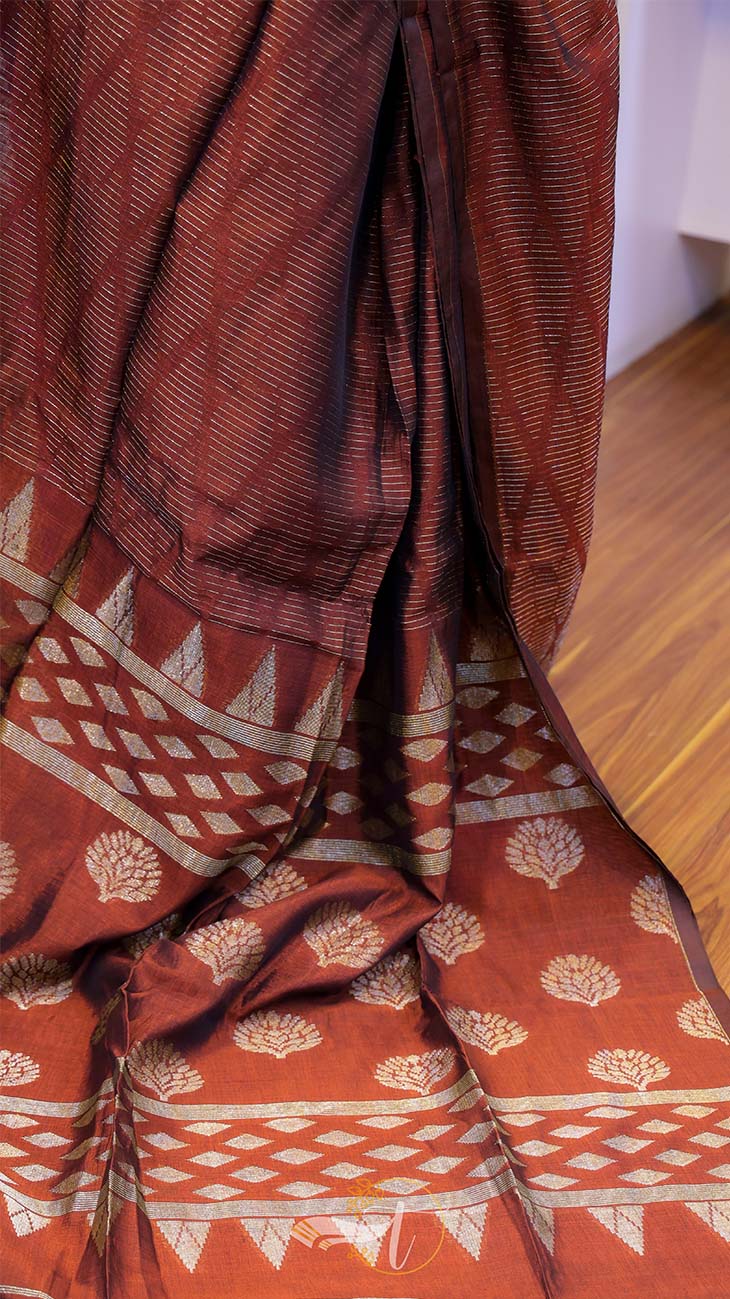 Red and white patterned fabric draped over a surface