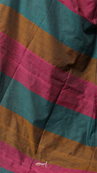 Close-up of a colorful fabric with horizontal stripes in red, green, and brown.