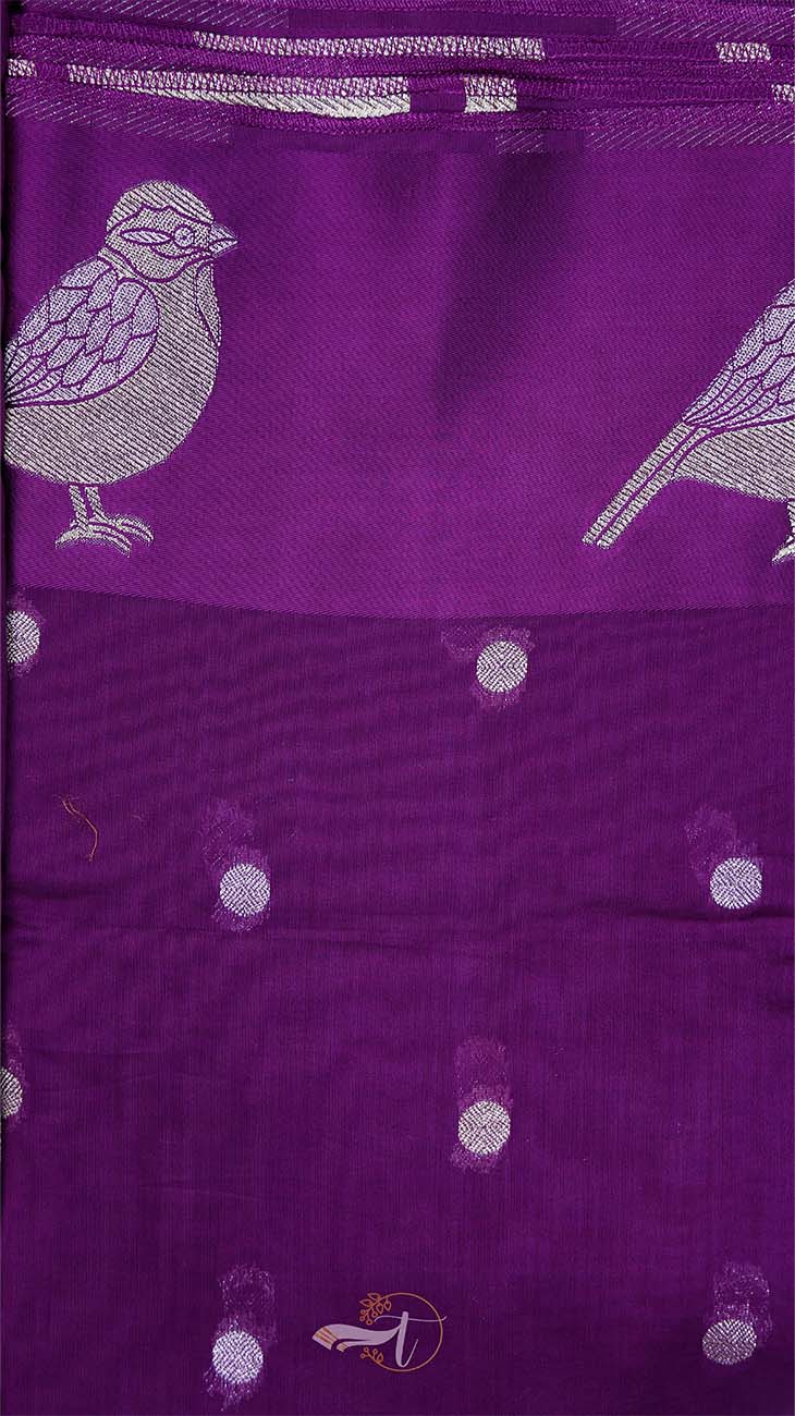 Purple fabric with bird and dot pattern