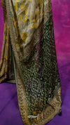 Traditional patterned fabric on a purple background