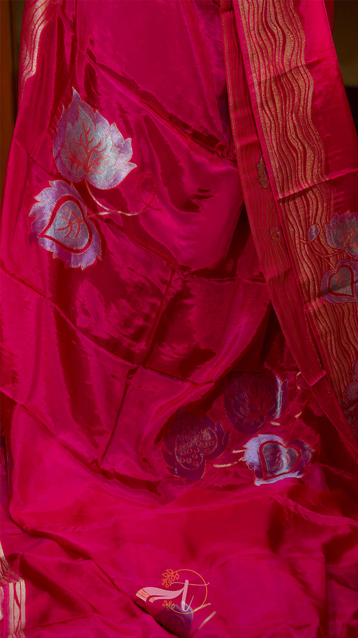 Red fabric with floral embroidery