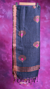 Dark blue scarf with pink and gold patterns on a pink background
