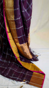 Saree with purple and gold checkered pattern on a white background