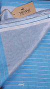 Blue fabric with white stripes and a 'Thanvi' tag on a black background