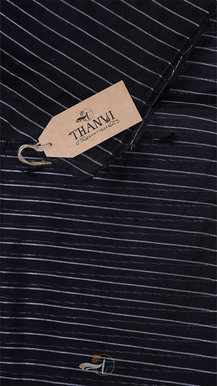 Black pinstripe shirt with a Thaniyagoda tag on a black background