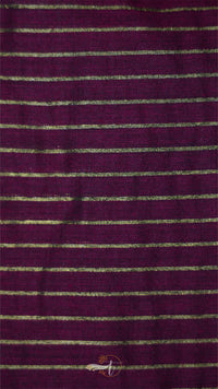 Close-up of purple fabric with thin gray stripes
