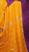 Yellow saree with white stripes on a purple background
