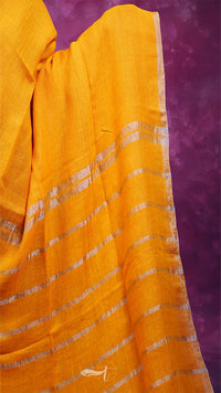 Yellow saree with white stripes on a purple background