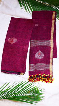 Magenta saree with gold border and decorative ends on a white background