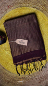 Textured fabric with a brand tag on a textured surface