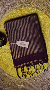 Textured fabric with a brand tag on a textured surface