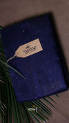 Blue fabric with a brand tag on a brown background