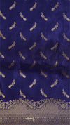 Navy blue fabric with gold peacock patterns