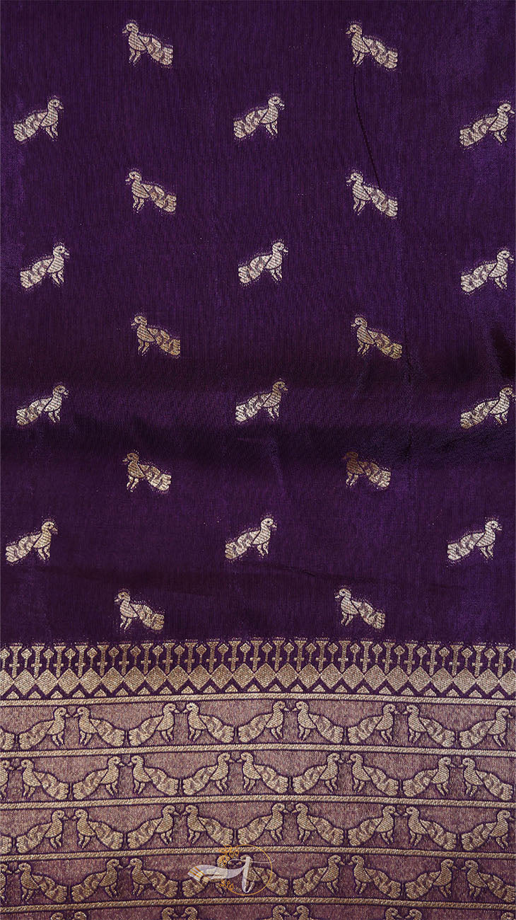 Purple fabric with white dog pattern and brown border