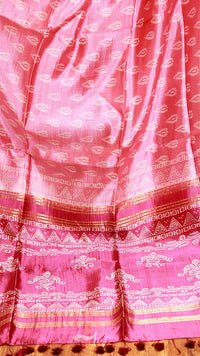 Pink fabric with white patterns and a border