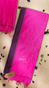 Pink and purple saree with a visible brand logo on a light background